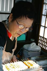 One of many food-vendors at the Takayama morning market, Japan